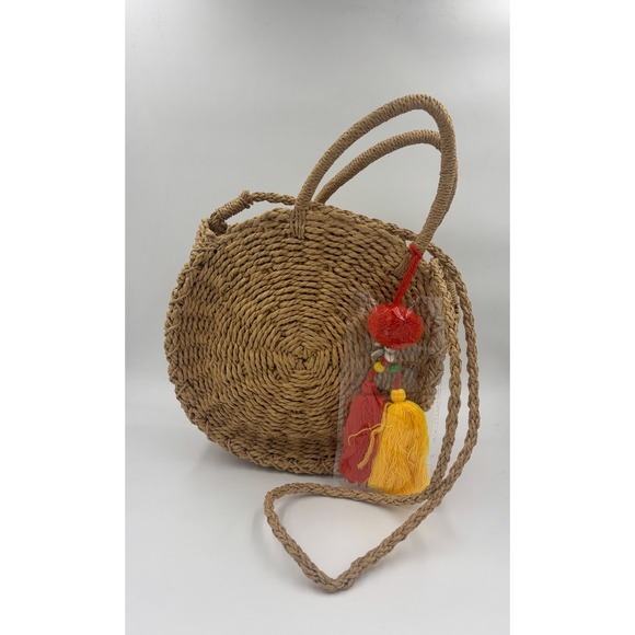 Carlos by Carlos Santana Handbags - NWT Carlos by Carlos Santana Round Straw Crossbody Bag Tan Woven Tassel‎ New